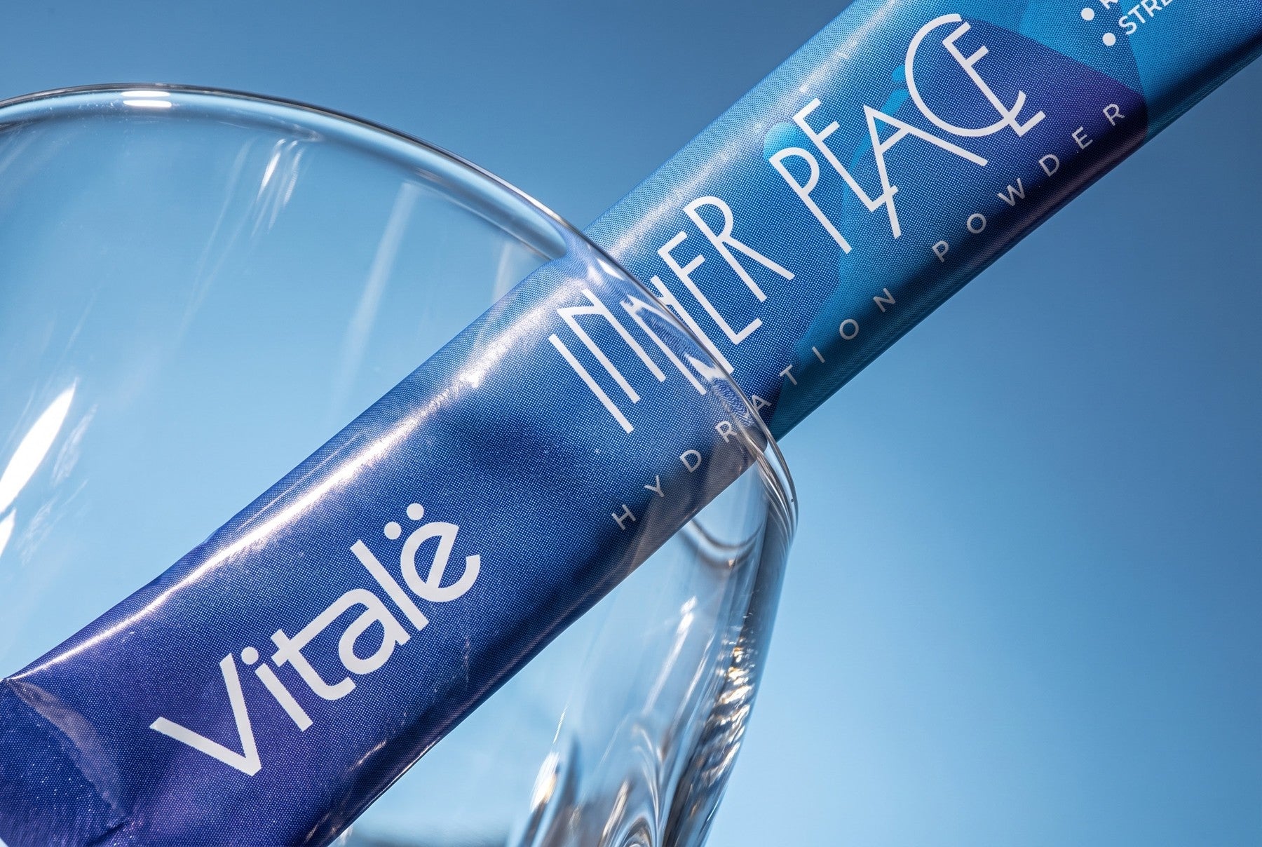 Vitalë Inner Peace sachet beside a glass